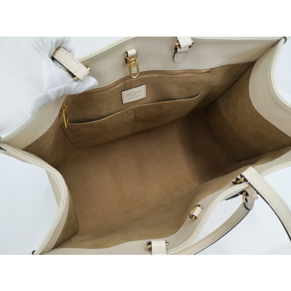 Louis Vuitton Onthego Empreinte Shoulder Bag Beige - Picture 10 of 10